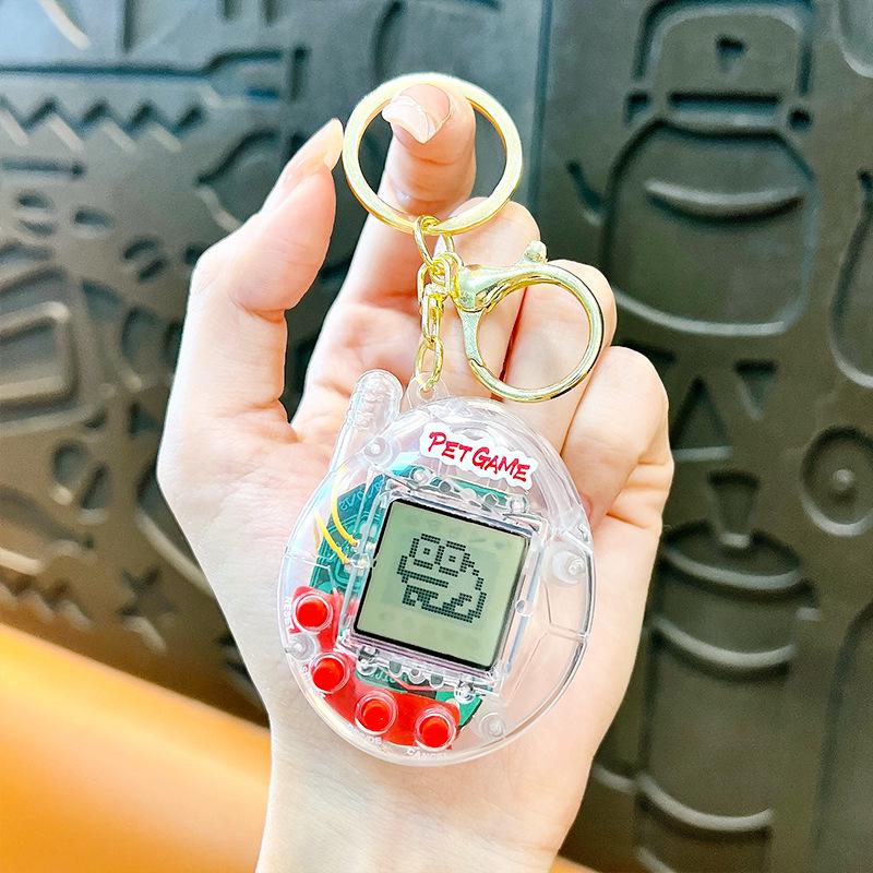 

Креативный мини электронный питомец брелок: Ручная игровая консоль с виртуальным питомцем белый