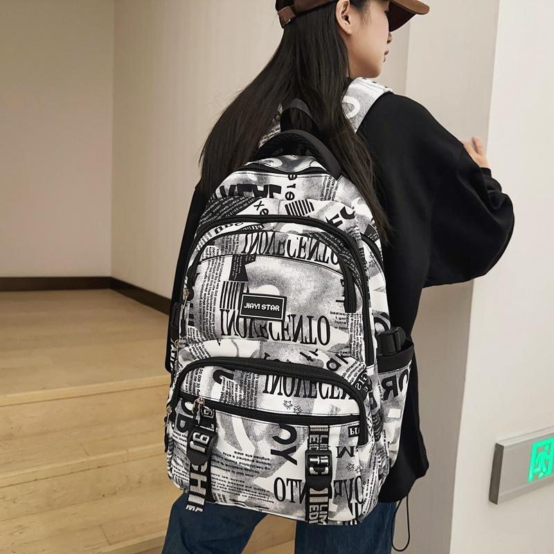 Trendy Brand Camouflage Backpack Men's Large Capacity Casual Junior High and School Student Schoolbag Female Harajuku Style Graffiti Couple Backpack