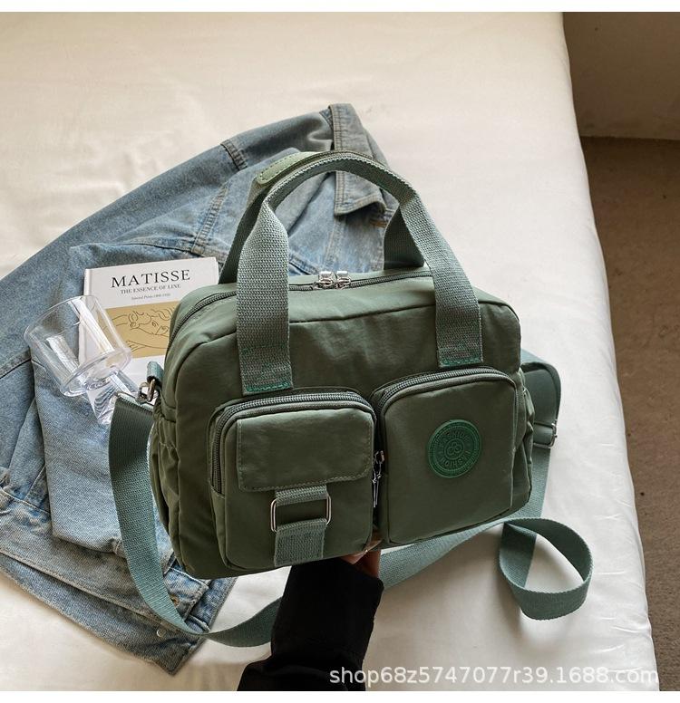 Korean Version of Casual Portable Small Square Bag Women's New Versatile Fashion Shoulder Messenger Bag Nylon Cloth Multi-pocket Pillow Bag