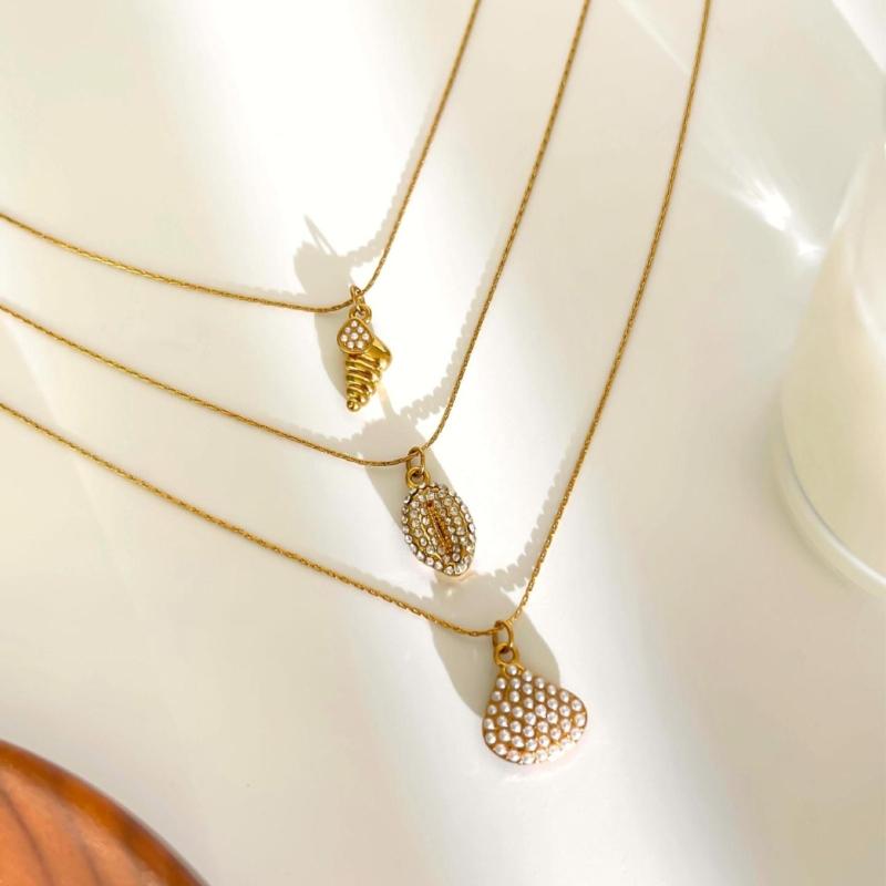 Trendy Spirals Shell Pendant Necklace In Stainless Steel Featuring Sparkling Rhinestones for Stylish Layer Look