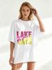 Lake Days Oversized T Shirt Black Pink And Yellow Gradient Text Sun Rays Print Summer Beach Vacation Wear