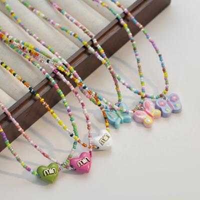 Collier avec pendentif en forme de petit nœud Love Min/petit, chaîne de clavicule couleur bonbon, bijoux faits à la main