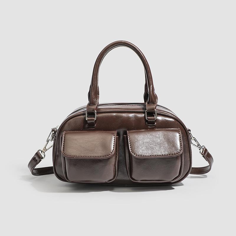Korean version of trendy niche design underarm baguette bag women's 2025 autumn new shoulder Boston bag bowling bag