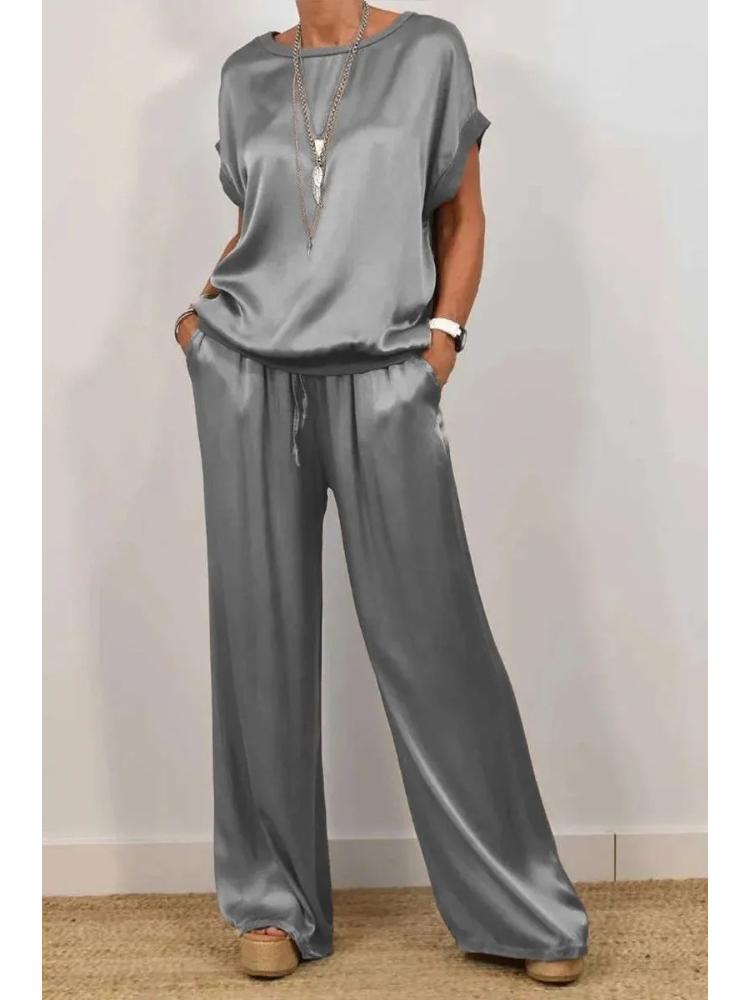 Set Top Bianco a Vestibilità Rilassata e Pantaloni a Gamba Larga a Vita Alta