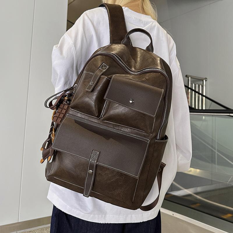 Schoolbag Hong Kong style retro backpack autumn and winter new simple PU large capacity student schoolbag versatile travel leisure backpack
