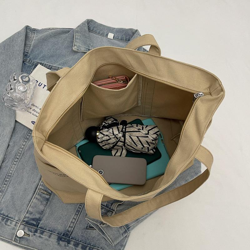Canvas bag large capacity new casual fashion tote bag Japanese literary niche commuter shoulder bag