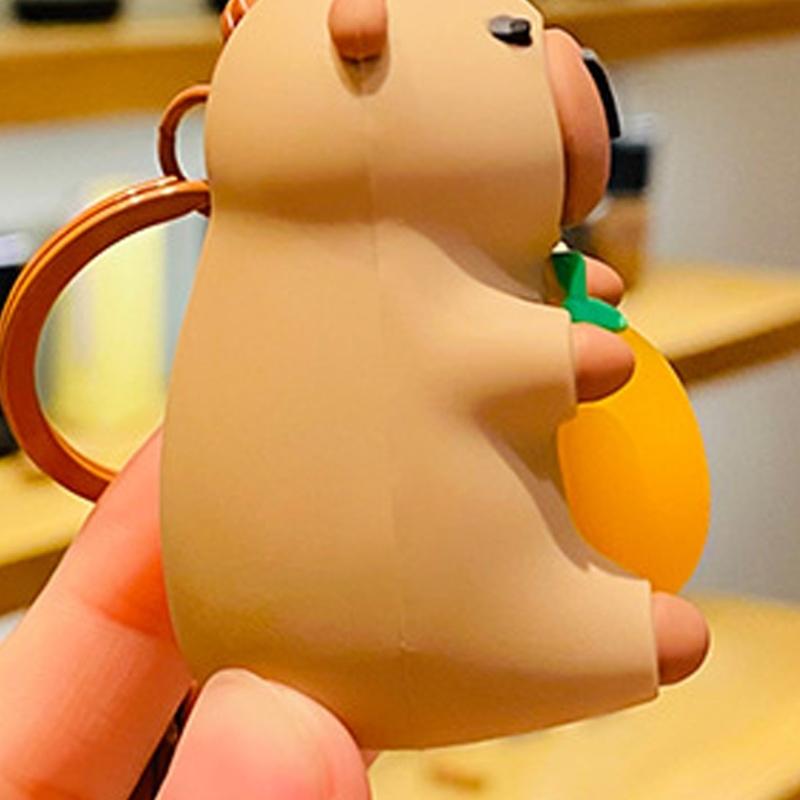 Glowing Capybara Keychain Soft PVC Animal Designs Capybara Hugging Orange Keyring Easy Carry Cute Keyring Accessory