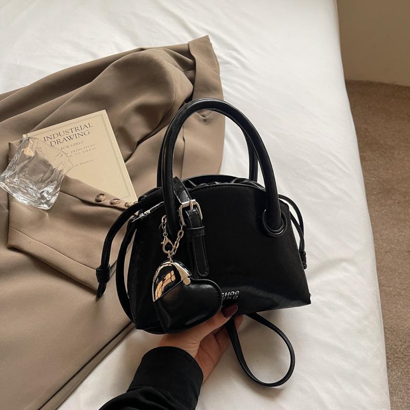 

Женская модная универсальная сумка через плечо 2025: Стильная сумочка и сумка-кроссбоди в форме боулинга Without Heart Pendant чёрный