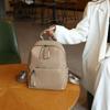 2024 Summer New Niche High-End Fashion Commuting Large-Capacity Backpack for Women, Simple and Sophisticated Travel Backpack