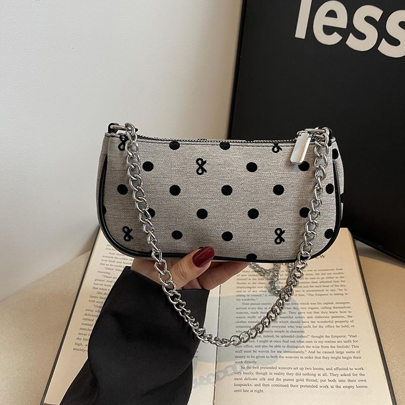 

Niche polka dot chain bag women s new versatile messenger bag fashion shoulder armpit bag