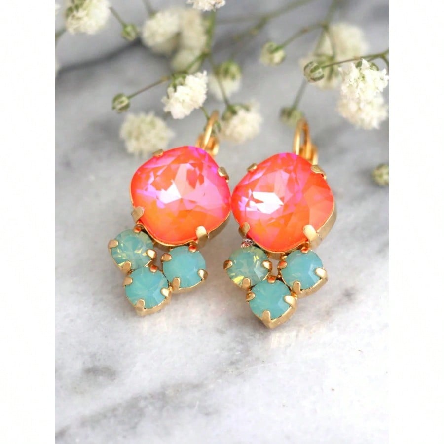 

A pair of colorful earrings, pink and orange with a mint green pendant, perfect for Independence Day/summer parties.