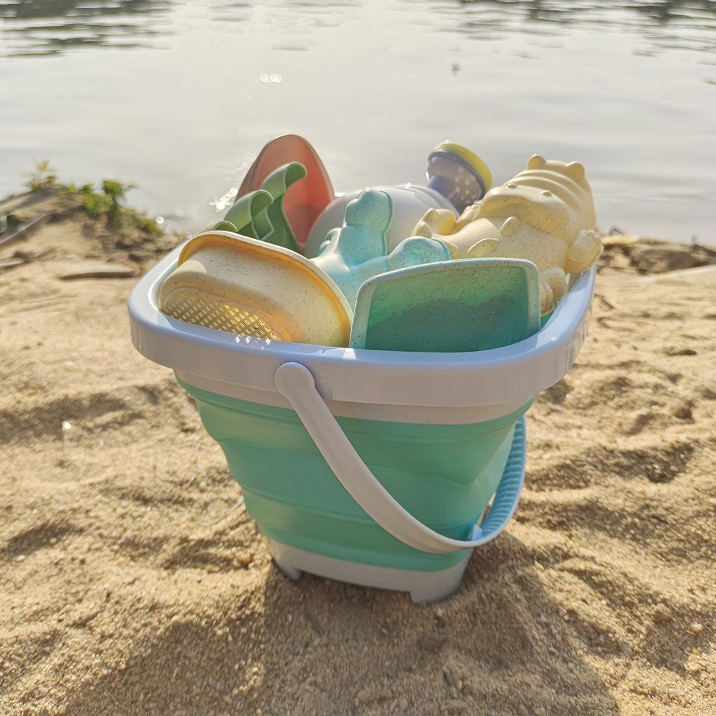 Giocattoli da spiaggia per bambini Set di giocattoli di sabbia per i più piccoli Giocattoli di sabbia con secchio pieghevole Pala Rastrello Set Stampi per sabbia Estate all'aperto