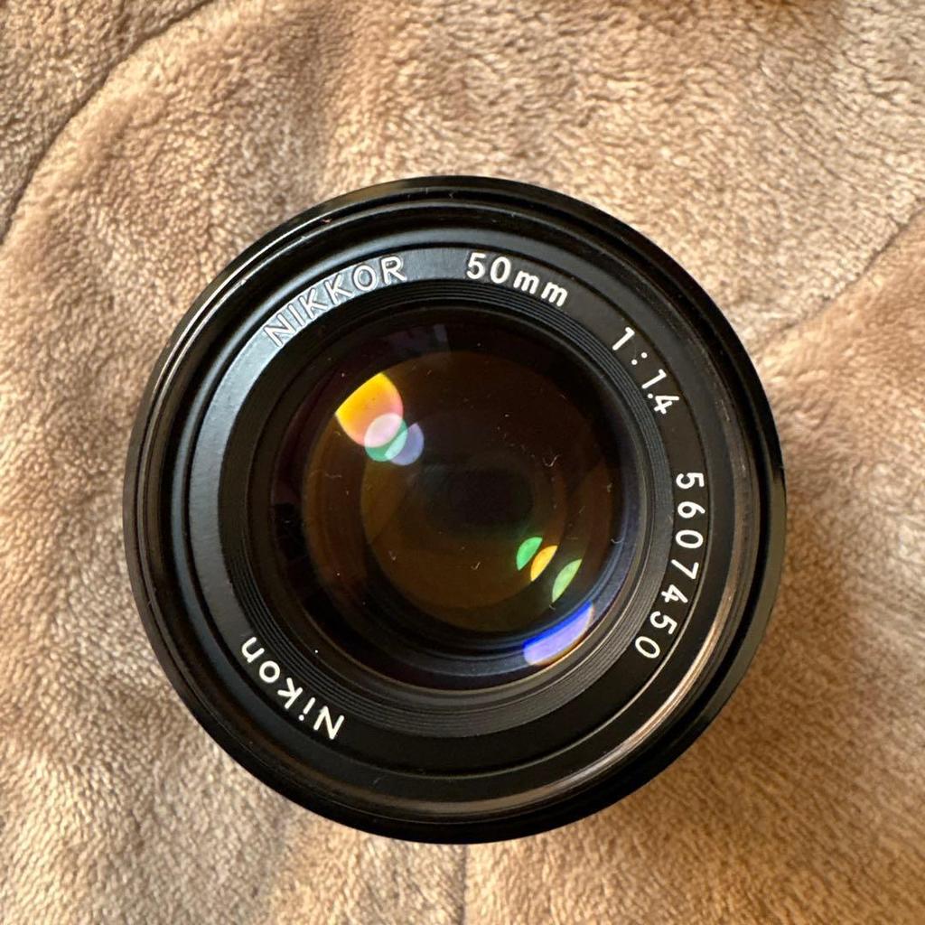 Used Nikon camera lens