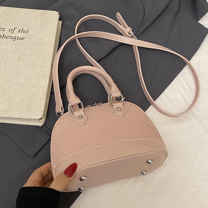 Korean Version of Niche Retro Style Contrasting Colors Splicing Portable Shell Bag Temperament Versatile Advanced Texture Commuter Messenger Bag Women