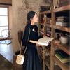 French new early spring lace-up temperament black skirt foreign style long dress good-looking and thin long-sleeved dress