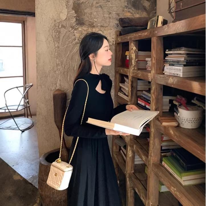 French new early spring lace-up temperament black skirt foreign style long dress good-looking and thin long-sleeved dress