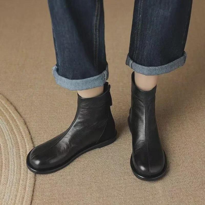 Flache Martin-Stiefel für Damen: Britischer Retro-Stil, Rundkopfnähte, weiches Leder und Sohle, vielseitige Stiefeletten für Herbst und Winter.