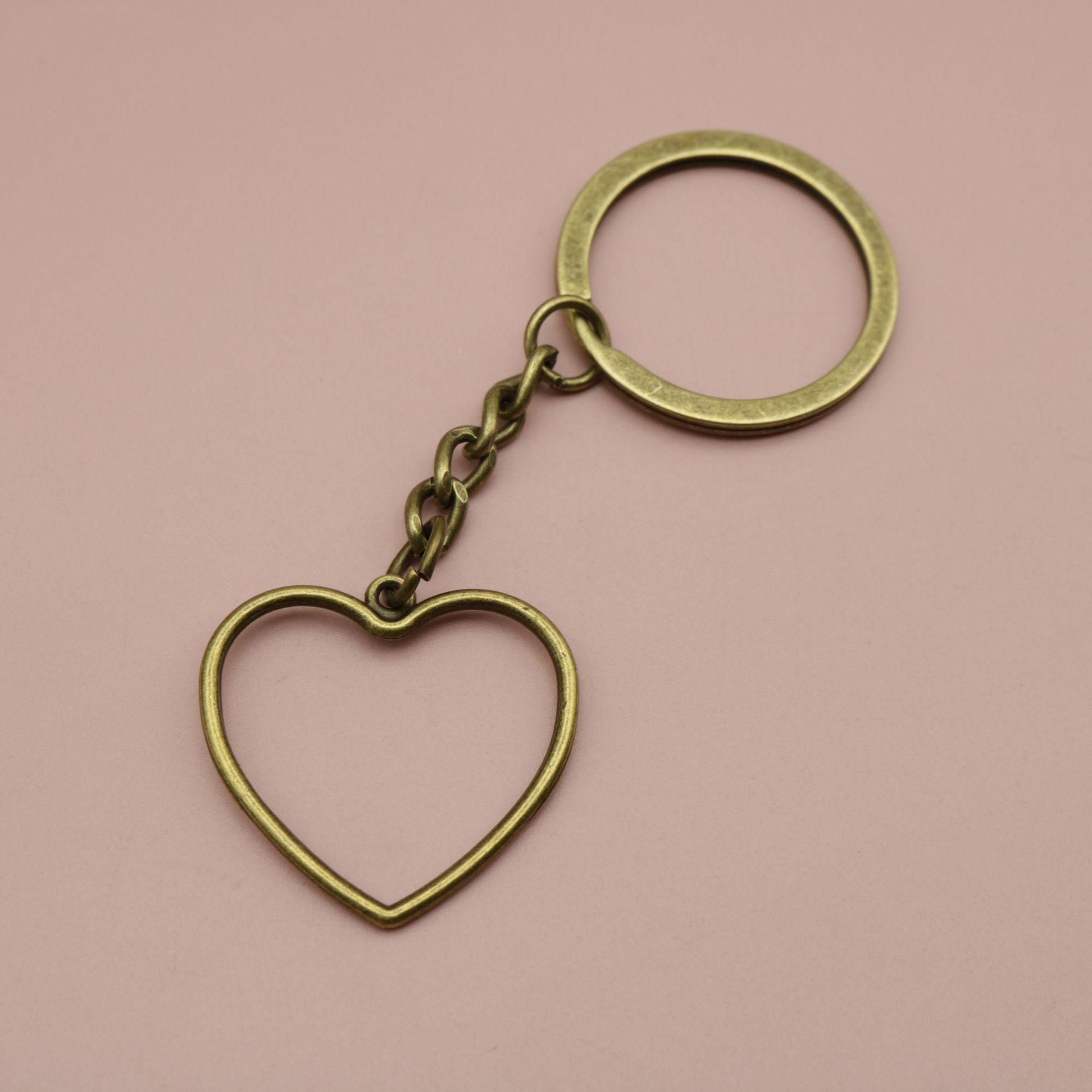 Heart-Shaped Hollow Keychain Pendant