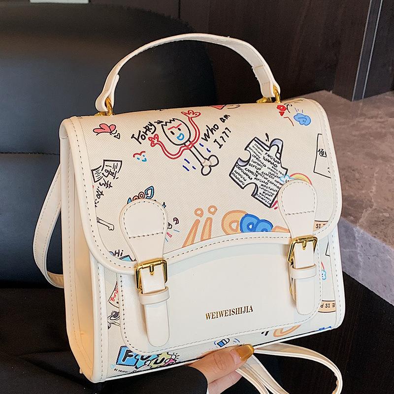 Korean version of college style cute cartoon handbag women 2025 new fashion casual simple backpack student schoolbag