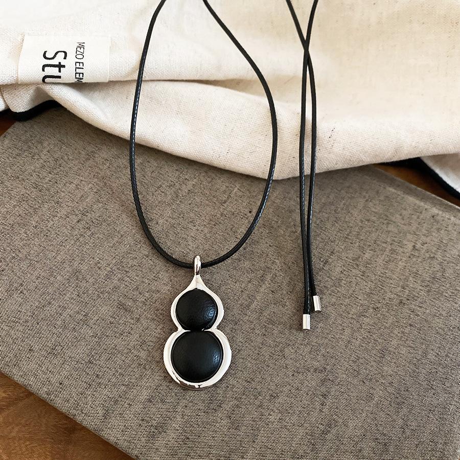 

Long Adjustable Black Color Rope Sweater Chain Chinese Style PU Leather Metal Bottle Gourd Pendant Necklaces for Women 94cm чёрный