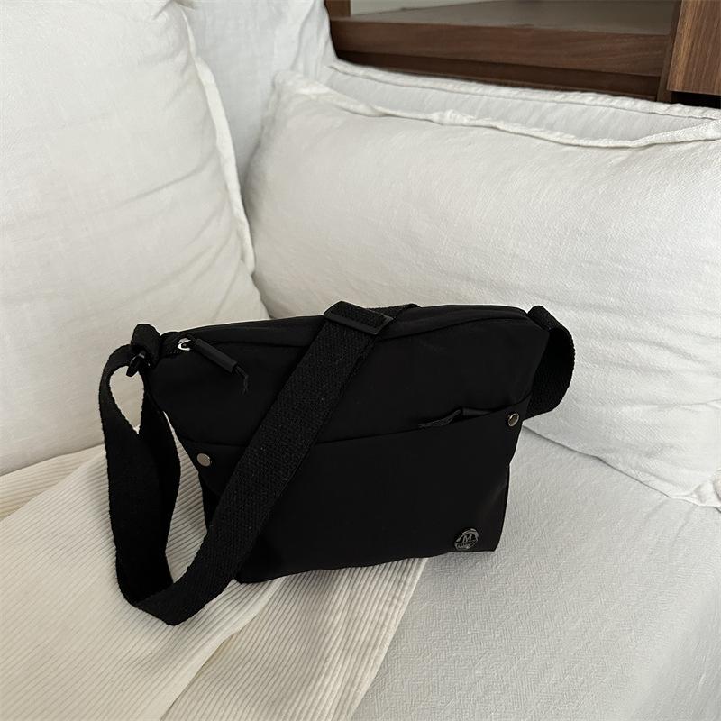 

Crossbody bag women 2025 new fashion versatile canvas bag lightweight waterproof leisure bag walking nylon small backpack women