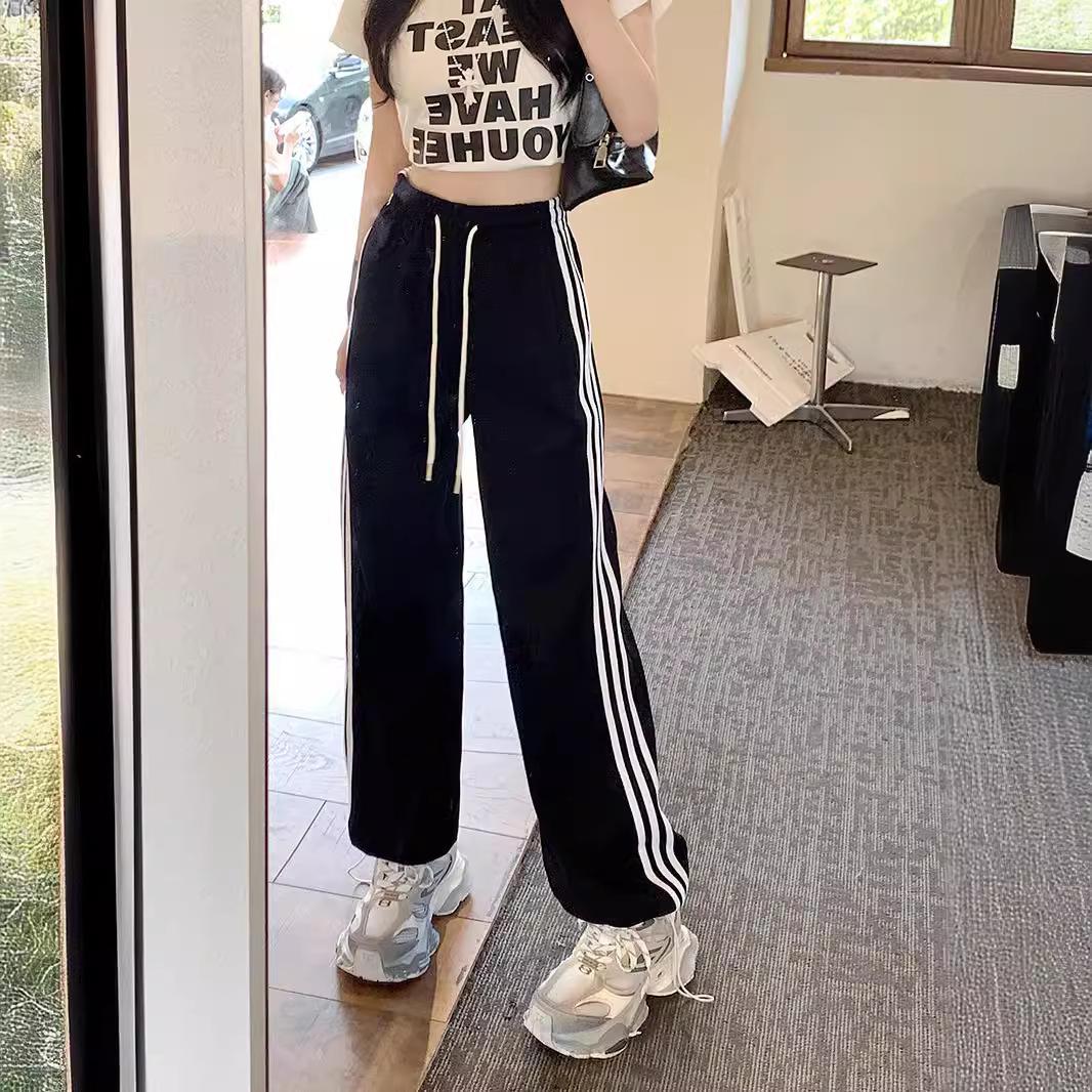 

Новые летние стильные белые и серые брюки с полосками по бокам для женщин, широкие брюки, повседневные свободные прямые спортивные брюки, спортивные брюки на шнурке 3XL