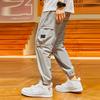 Li Ning Badfive Sports Basketball Series Woven Cuff Joggers Men Joggers Gray AYKR363-3