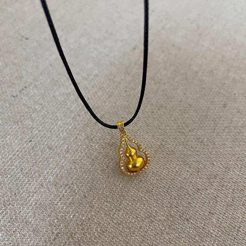 

Niche Design Sense вращающееся ожерелье с подвеской в виде тыквы и циркона для женщин, новое китайское легкое роскошное универсальное ожерелье для свитера