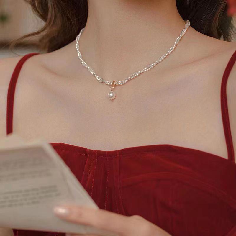 Retro Double-Layer Pearl Necklace - 2024 French-Style Twist Clavicle Chain for Women