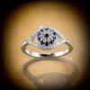 Gioiello da donna alla moda, anello occhio di bue in rame micro-intarsiato con zircone cubico sintetico blu scintillante, accessorio di moda unico in stile antico elegante