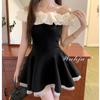 Date day French one-word shoulder splicing ruffle edge waist thin puffy dress live broadcast explosion one piece