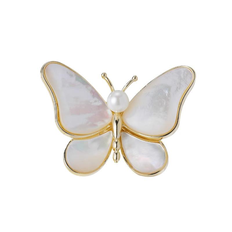 Meng Wanzhou's Pearl Butterfly Brooch: A Chic Accessory Protecting the Mother-of-pearl, Perfect for Elegant Women's Suits.