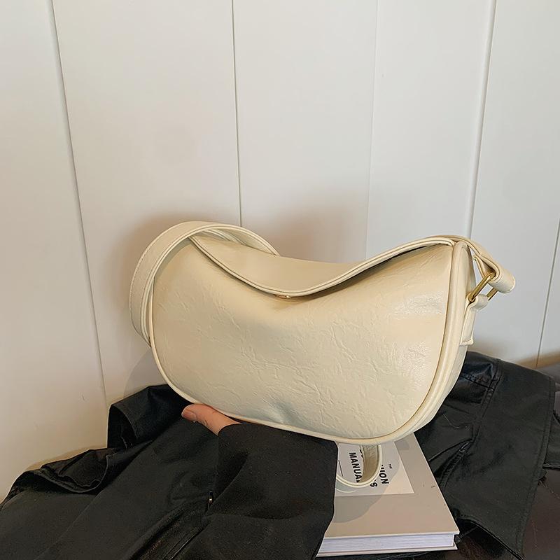 Retro Popular Bag Women's New Niche Design Commuter Shoulder Bag High-end Fashion Messenger Dumpling Bag