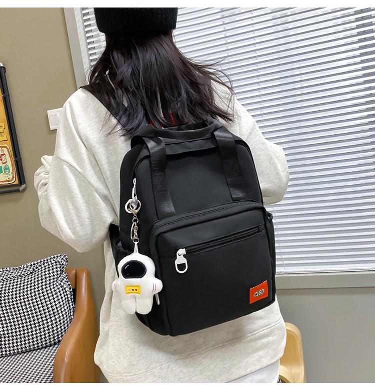 Unisex Primary School Student Backpack Waterproof Handbag With Colorful Patchwork Design