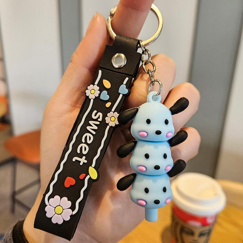 Yugui Dog Gestapelter Le Schlüsselanhänger Niedlicher Cartoon Melody Pudding Dog PVC Puppe Taschenanhänger