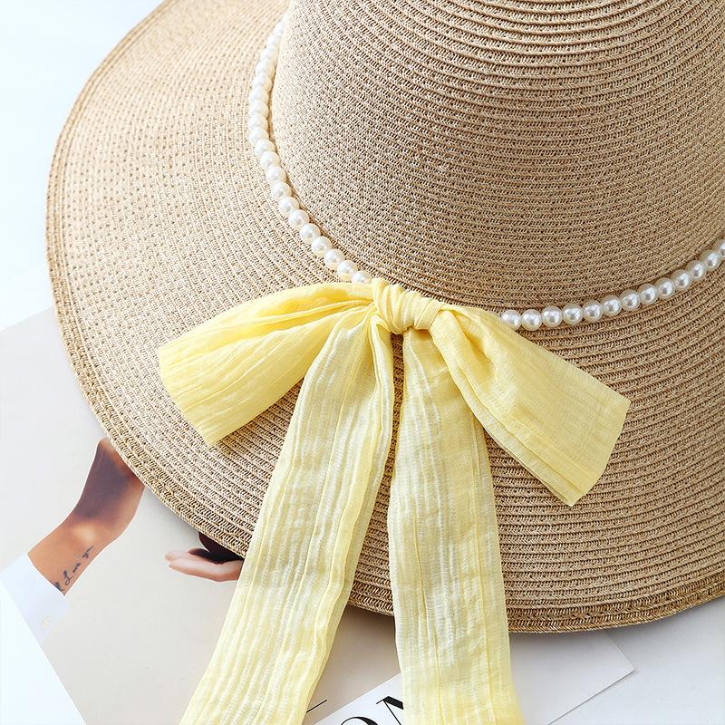 New pearl chain bow straw hat women's spring and summer big brim outdoor sunscreen hat vacation style travel sun hat