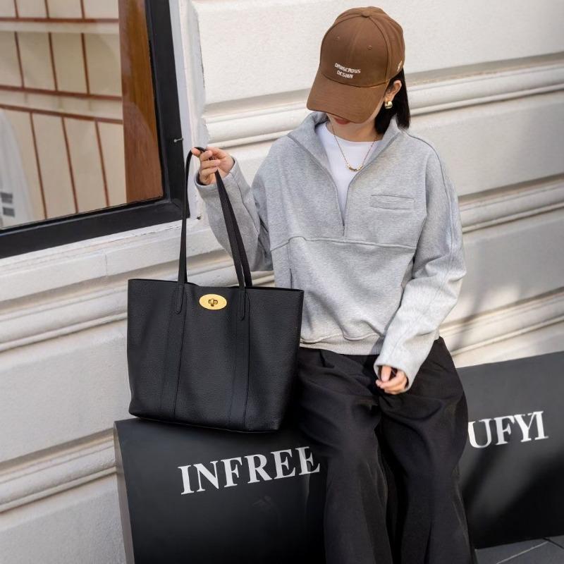 The first layer cowhide women's bag, the new simple and versatile commuter large-capacity tote bag, portable shoulder bag.