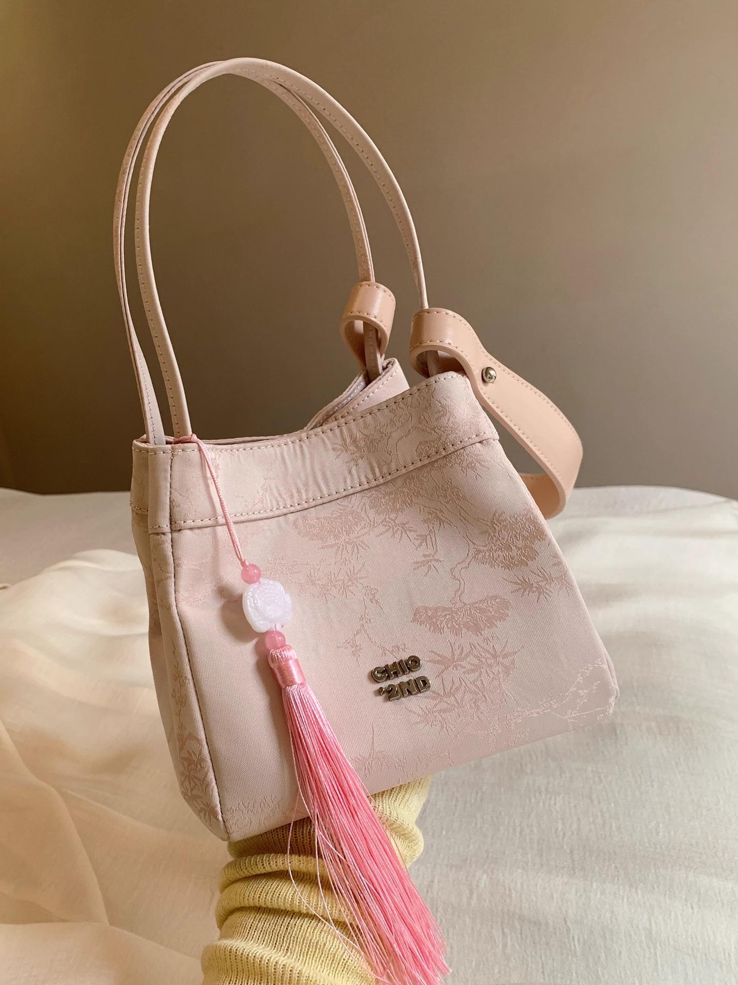 

Light Feather Silver Butterfly Bucket Bag Women s 2024 New Commuter Handbag One Shoulder Crossbody Bag рожевий