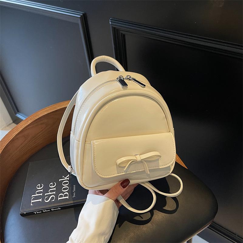Korean version of fashion portable small bag women's 2025 new bow backpack casual schoolbag