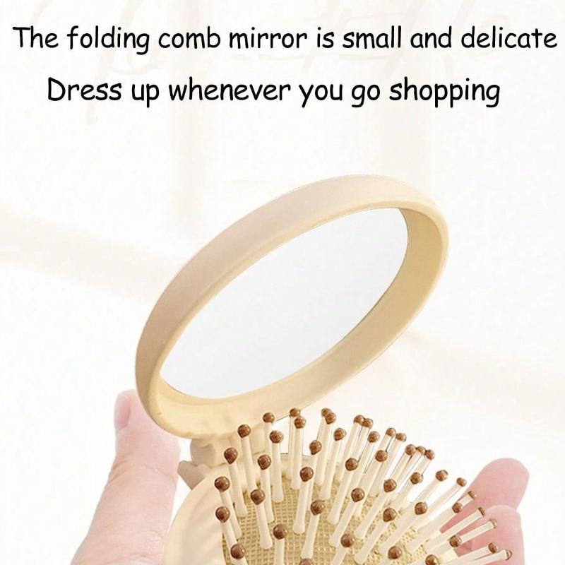 Süßer Cartoon faltbarer Airbag-Kamm tragbarer Mini-Kissen-Haarkamm mit Spiegel für Frauen integrierter Massagekamm leichtgewichtig