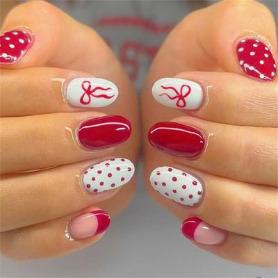 Confezione da 24 Unghie Finte Design Francese Unghie Artificiali Donne Decorazioni Design Fiocchi Rossi Punti Bianchi