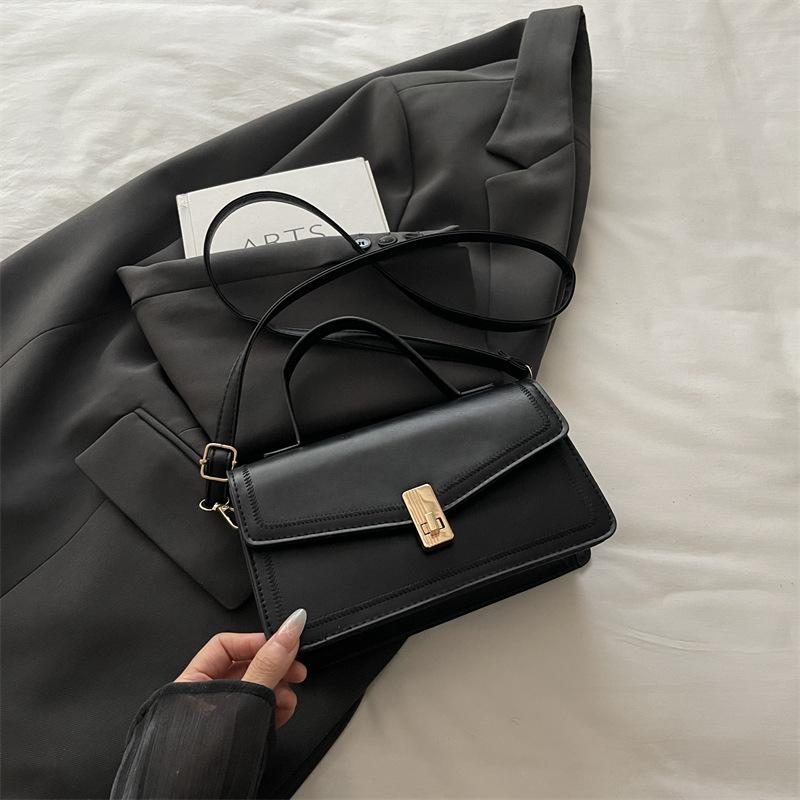 

Niche simple and fashionable solid color bag commuter bag women s autumn new trend handbag oblique span bag women