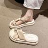 Slippers women's summer wear 2025 new French camellia thick-soled cover toe cool slippers with skirt soft-soled beach shoes