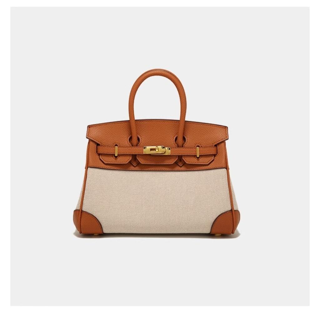 2025 Nuova borsa a contrasto platino borsa da lavoro di alta gamma borsa a tote in tela e pelle di grande capacità da donna all'ingrosso