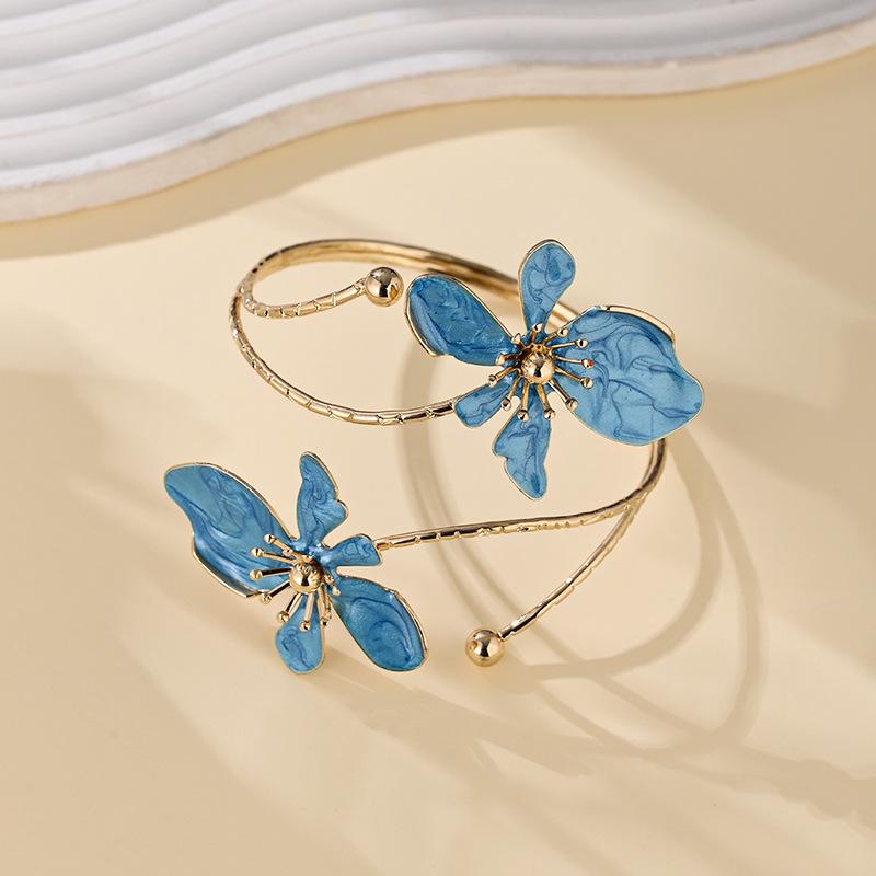 Stylish and sexy floral open-face bracelet perfect for everyday wear holidays and parties; adjustable bracelet