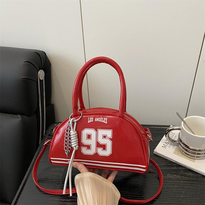 Bag women's new bowling bag fashionable oily leather splicing contrasting color digital decoration portable women's handbag
