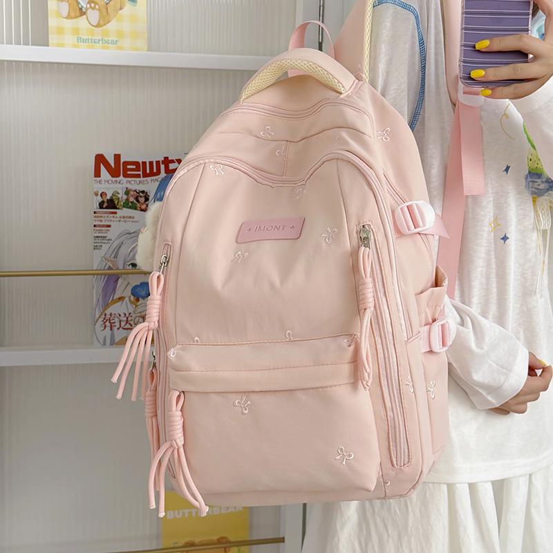 Schoolbag hot sale high value new Japanese ins fresh sweet candy color butterfly backpack junior high school students light shoulders