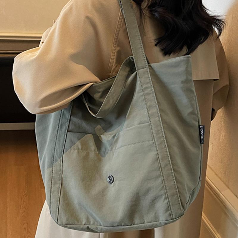 Large-capacity tote canvas bag, high-value commuting, versatile literary and artistic student clothing book, shoulder cloth bag bag when going to wor