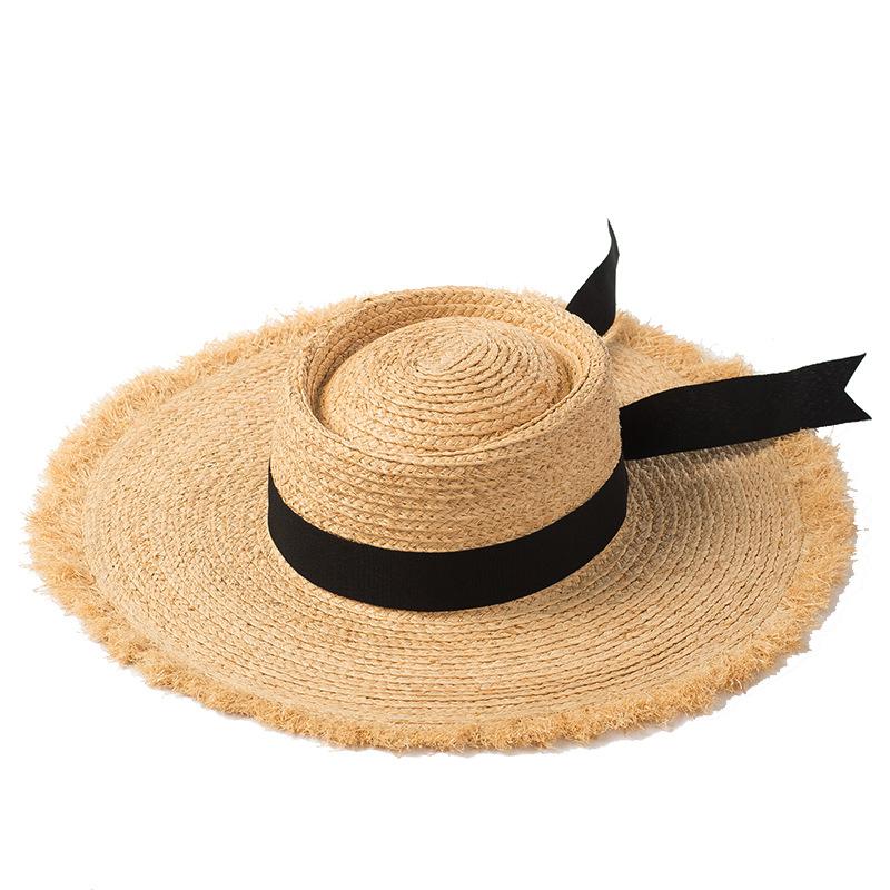 Spring and summer new ring flat top bow streamer raffia big eaves hat women's sunshade rough edge beach straw hat