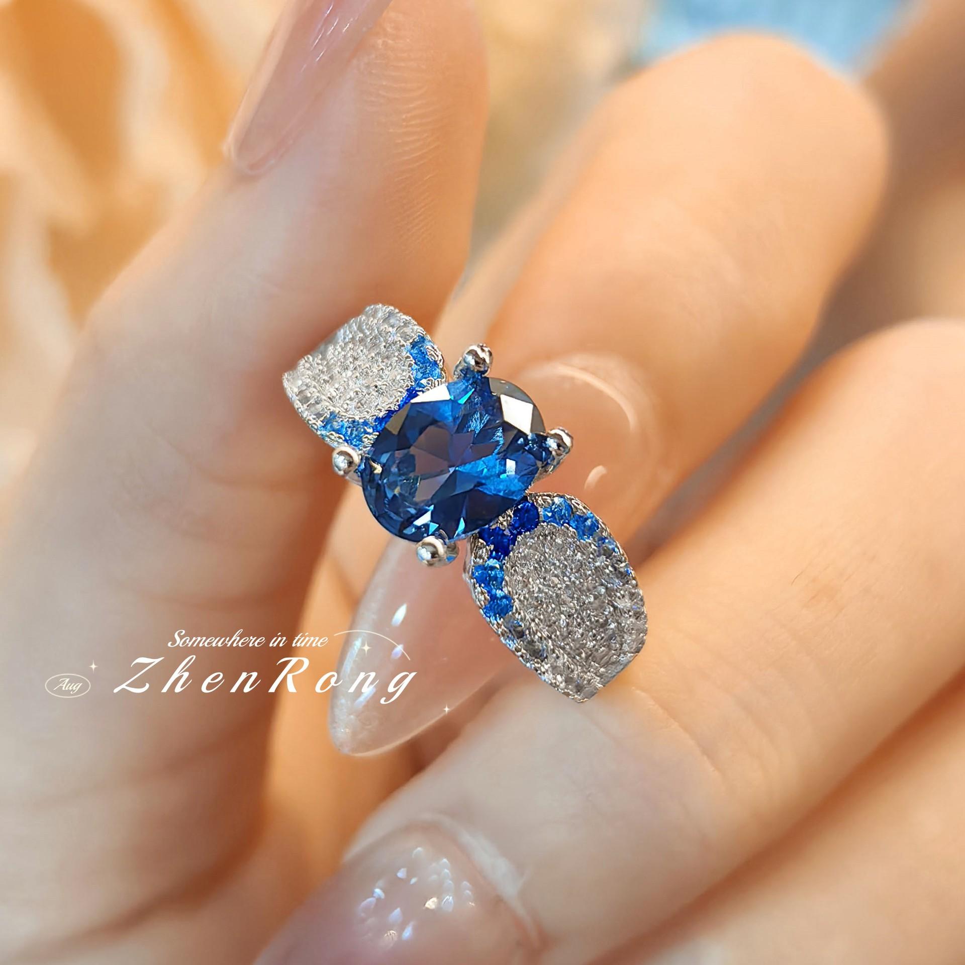 

2026 New Trend Fashion Goose Egg Shape London Blue Zircon Gradual Change Blue Spinel Ring Temperament Niche Design Versatile Simple Retro Women Resizable